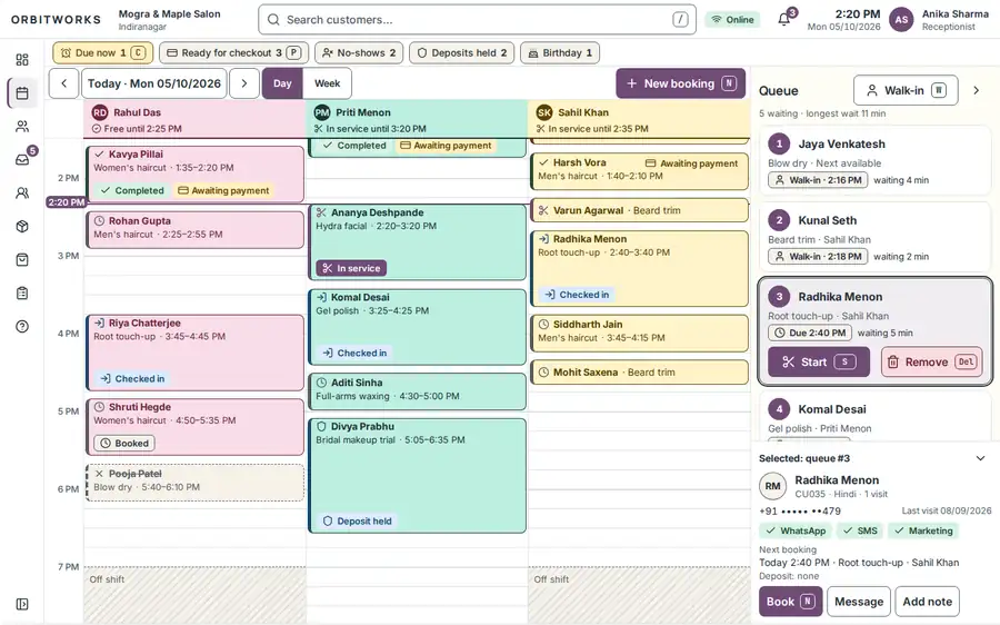 Salon OS reception cockpit: day calendar with artist columns, booking status chips and live walk-in queue